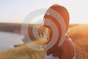 Pensive relaxed girl thinking and looking forward