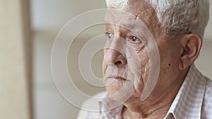 Pensive sad elder senior man looking away feel upset