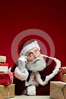 Pensive Santa Claus on Red