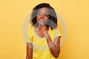 Pensive serious young woman thinking about problem, confused emotion