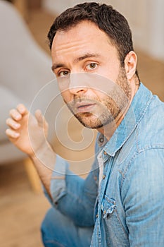 Pensive surprised man shocked with answer