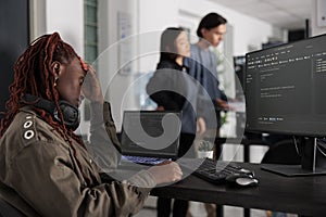 Pensive system engineer thinking at programming ideas trying to write html code