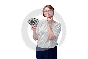 Pensive teacher holds money in dollars, isolated on a white backgroun