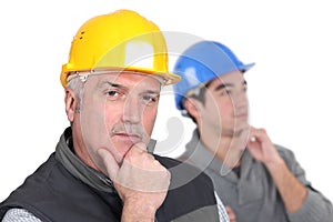 Pensive tradesmen