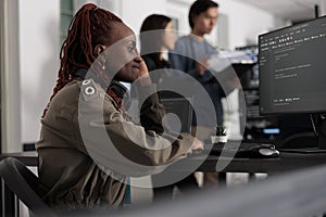Pensive web developer thinking at software script development