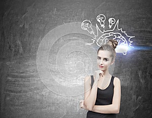 Pensive woman in a black tank top, brain bulbs