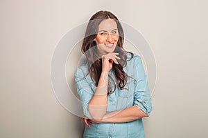 Pensive woman is laughing