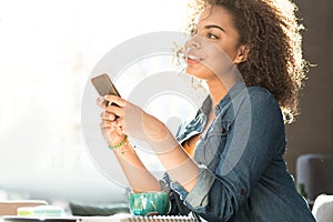 Pensive woman sitting in cafe