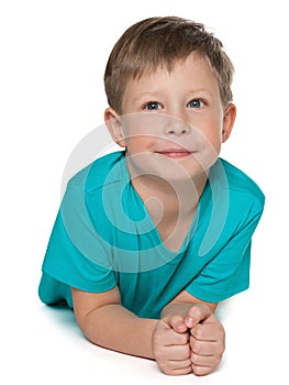 Pensive young boy on the white background