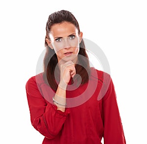 Pensive young woman asking a question to herself