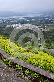 Penstocks carrying water to Fort William aluminium smelter plant, Loch Linnhe in background, cloudy foggy day