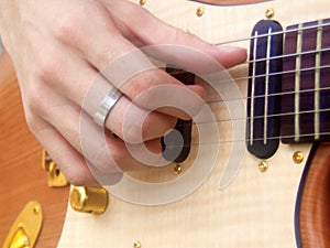 Pentatonic scale. Right hand with electric guitar