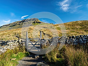 Pen-y-ghent mountain with gate and path