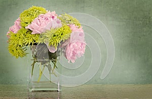 Peonies and chrysanthemums in vase