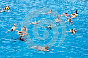 People actively relax, swim in the Red Sea. Activity, Swimming, Water landscape. Egypt, Africa