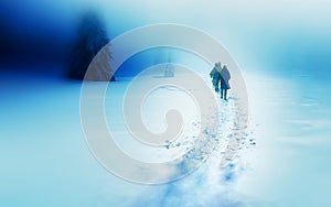 People alone in Winter blizard. Beautiful mountain snowy landscape. photo