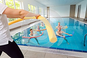 People in aqua fitness class during a physical therapy session