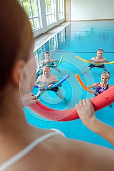 People in aqua fitness class during a physical therapy session