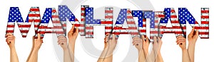 People arms hands holding up wooden letter lettering forming words Manhattan new york city in USA american national flag colors