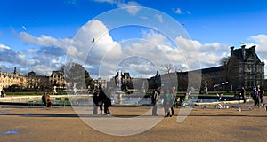 People around fountain in Paris