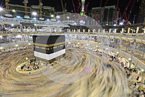 Muslim pilgrims from all around the world doing tawaf photo