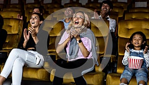 People audience enjoy watching movie in theater