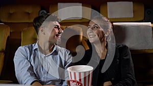 People audience watching movie in cinema theater.