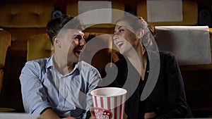 People audience watching movie in cinema theater.