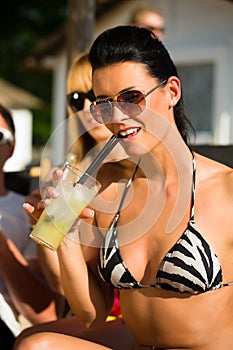 People at beach drinking having a party