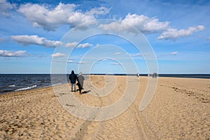 People on the beach in Rewa in northern Poland. Rewa is a popular tourist resort on the Baltic Sea