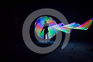 People with beautiful light painting artwork