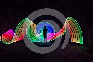 People with beautiful light painting artwork