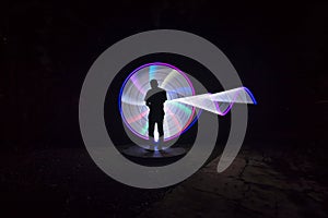 People with beautiful light painting artwork