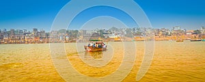 People on boat at Varanasi banaras tourists UP India