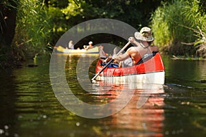 People boating on river