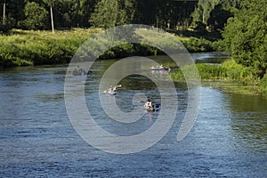 People boating on river, peacefull nature scene