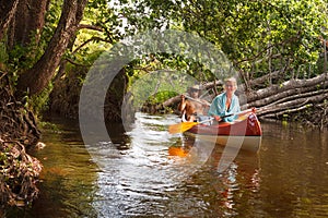 People boating on river