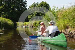 People boating on river photo