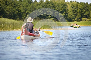 People boating on river