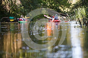 People boating on river