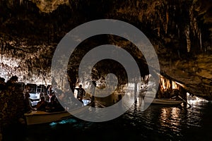 People on boats in Drach Caves, Mallorca photo