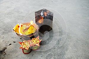 People burn joss paper gold and silver paper for worship