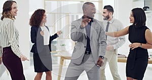 People, business and celebration dancing in office for winning deal, agreement or company growth. Men, women and
