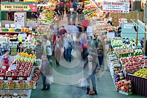 People buy groceries at Jean-Talon Market