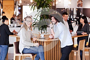 People at a cafe bar. Having fun. Conversations. Meetings. Casual and formal clothings