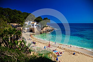 People at the Cala Gat beach