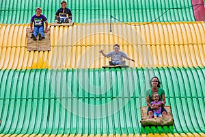 People on carnival slide at state fair