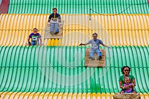 People on carnival slide at state fair