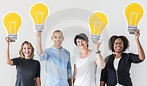People carrying light bulb icons