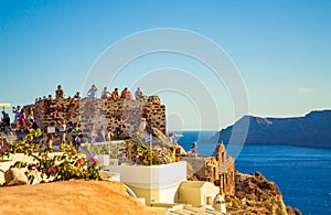 Castle of Oia crowded viewpoint on sunset Santorini Greece